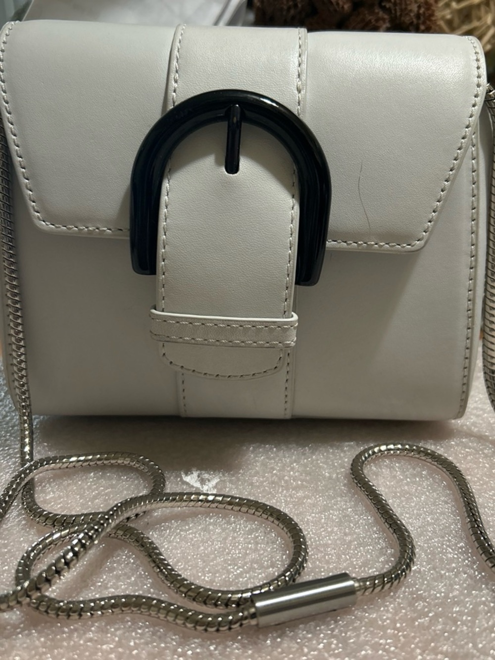 Couronne White Shoulder Crossbody Bag with Black Buckle Accent